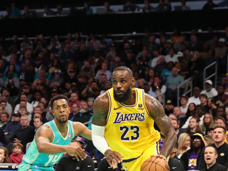 CHARLOTTE, NC - FEBRUARY 5: LeBron James #23 of the Los Angeles Lakers handles the ball during the game  against the Charlotte Hornets on February 5, 2024 at Spectrum Center in Charlotte, North Carolina. NOTE TO USER: User expressly acknowledges and agrees that, by downloading and or using this photograph, User is consenting to the terms and conditions of the Getty Images License Agreement.  Mandatory Copyright Notice:  Copyright 2024 NBAE (Photo by Brock Williams-Smith/NBAE via Getty Images)