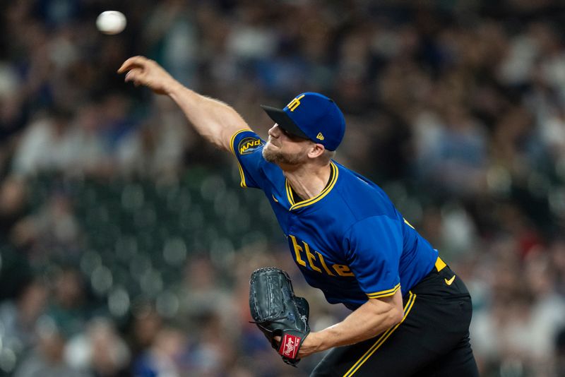 May 10, 2024; Seattle, Washington, USA; Seattle Mariners reliever Austin Voth (30) delivers a pitch during the ninth inning against the Oakland Athletics at T-Mobile Park. Mandatory Credit: Stephen Brashear-USA TODAY Sports