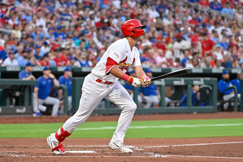 Jul 28, 2023; St. Louis, Missouri, USA;  St. Louis Cardinals center fielder Lars Nootbaar (21) hits his second solo home run of the game against the Chicago Cubs during the third inning at Busch Stadium. Mandatory Credit: Jeff Curry-USA TODAY Sports