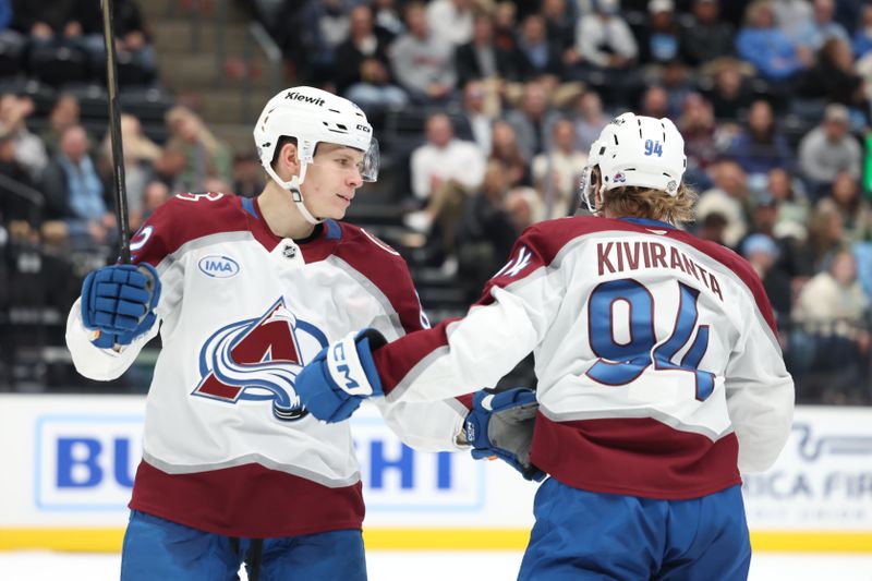 Oct 24, 2024; Salt Lake City, Utah, USA; Colorado Avalanche left wing Joel Kiviranta (94) celebrates scoring a goal with center Ivan Ivan (82) during the third period at Delta Center. Mandatory Credit: Rob Gray-Imagn Images