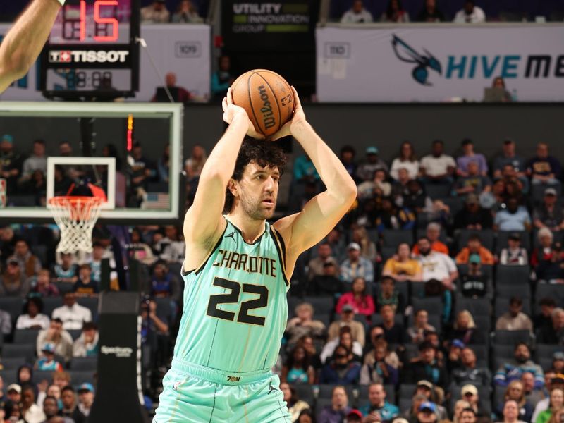 CHARLOTTE, NC - FEBRUARY 1: Vasilije Micic #22 of the Charlotte Hornets  looks to pass the ball during the game against the Denver Nuggets on February 1, 2025 at Spectrum Center in Charlotte, North Carolina. NOTE TO USER: User expressly acknowledges and agrees that, by downloading and or using this photograph, User is consenting to the terms and conditions of the Getty Images License Agreement. Mandatory Copyright Notice: Copyright 2025 NBAE (Photo by Kent Smith/NBAE via Getty Images)