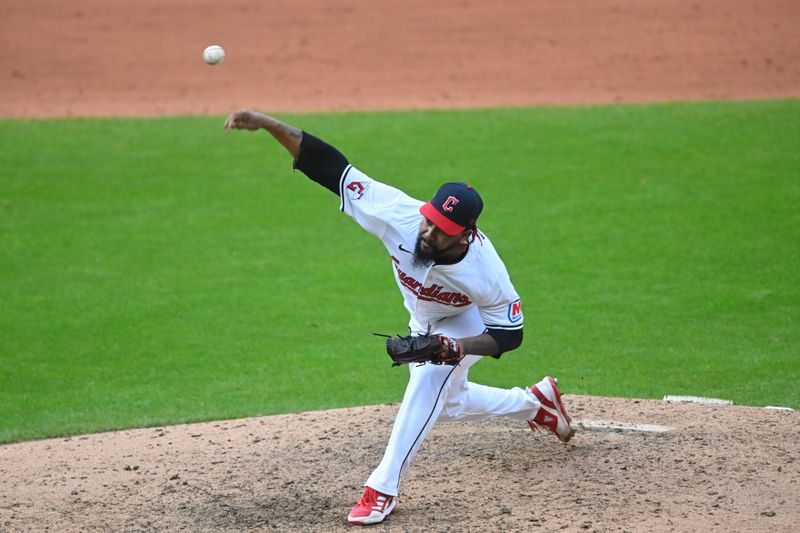 Oct 12, 2024; Cleveland, Ohio, USA; Cleveland Guardians pitcher Emmanuel Clase (48) pitches in the ninth inning against the Detroit Tigers during game five of the ALDS for the 2024 MLB Playoffs at Progressive Field. Mandatory Credit: David Richard-Imagn Images