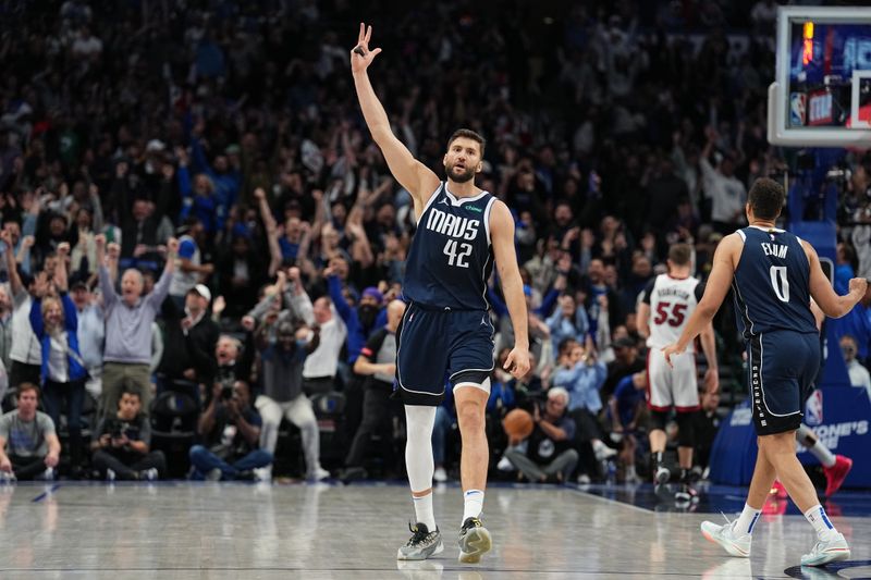 DALLAS, TX - MARCH 7: Maxi Kleber #42 of the Dallas Mavericks celebrates during the game against the Miami Heat on March 7, 2024 at the American Airlines Center in Dallas, Texas. NOTE TO USER: User expressly acknowledges and agrees that, by downloading and or using this photograph, User is consenting to the terms and conditions of the Getty Images License Agreement. Mandatory Copyright Notice: Copyright 2024 NBAE (Photo by Glenn James/NBAE via Getty Images)