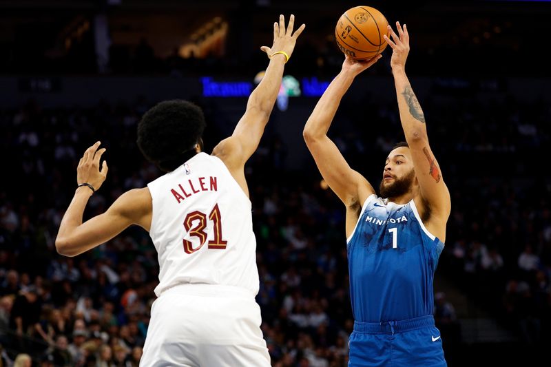 MINNEAPOLIS, MINNESOTA - MARCH 22: Kyle Anderson #1 of the Minnesota Timberwolves passes the ball against Jarrett Allen #31 of the Cleveland Cavaliers in the second quarter at Target Center on March 22, 2024 in Minneapolis, Minnesota. NOTE TO USER: User expressly acknowledges and agrees that, by downloading and or using this photograph, User is consenting to the terms and conditions of the Getty Images License Agreement. (Photo by David Berding/Getty Images)