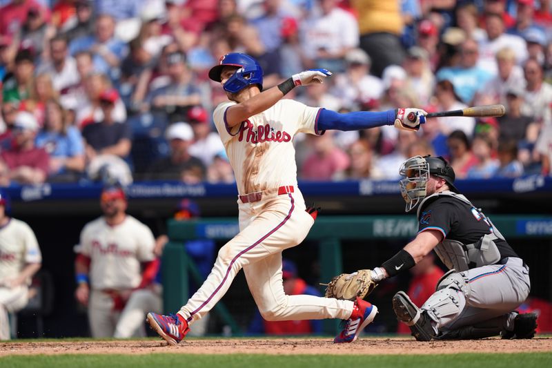 Apr 19, 2025; Philadelphia, Pennsylvania, USA; Philadelphia Phillies infielder Trea Turner (7) hits a single against the Miami Marlins in the seventh inning at Citizens Bank Park. Mandatory Credit: Kyle Ross-Imagn Images