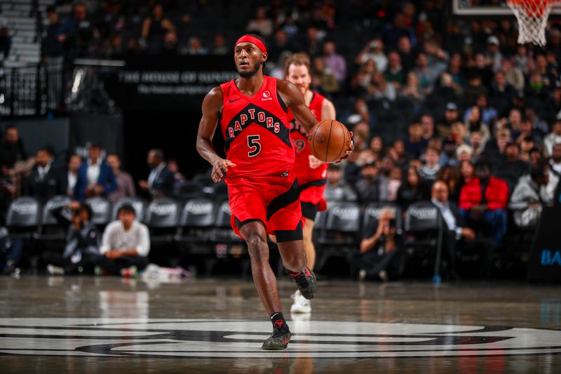 BROOKLYN, NY - OCTOBER 18: Immanuel Quickley #5 of the Toronto Raptors dribbles the ball during the game on October 18, 2024 at Barclays Center in Brooklyn, New York. NOTE TO USER: User expressly acknowledges and agrees that, by downloading and or using this Photograph, user is consenting to the terms and conditions of the Getty Images License Agreement. Mandatory Copyright Notice: Copyright 2024 NBAE (Photo by David L. Nemec/NBAE via Getty Images)