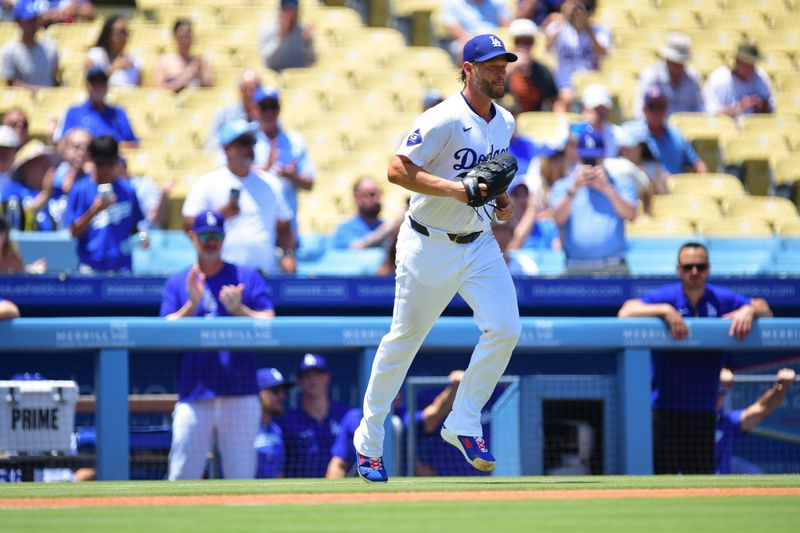 Jul 25, 2024; Los Angeles, California, USA; Los Angeles Dodgers starting pitcher Clayton Kershaw (22) takes the field against the San Francisco Giants at Dodger Stadium. Mandatory Credit: Gary A. Vasquez-USA TODAY Sports