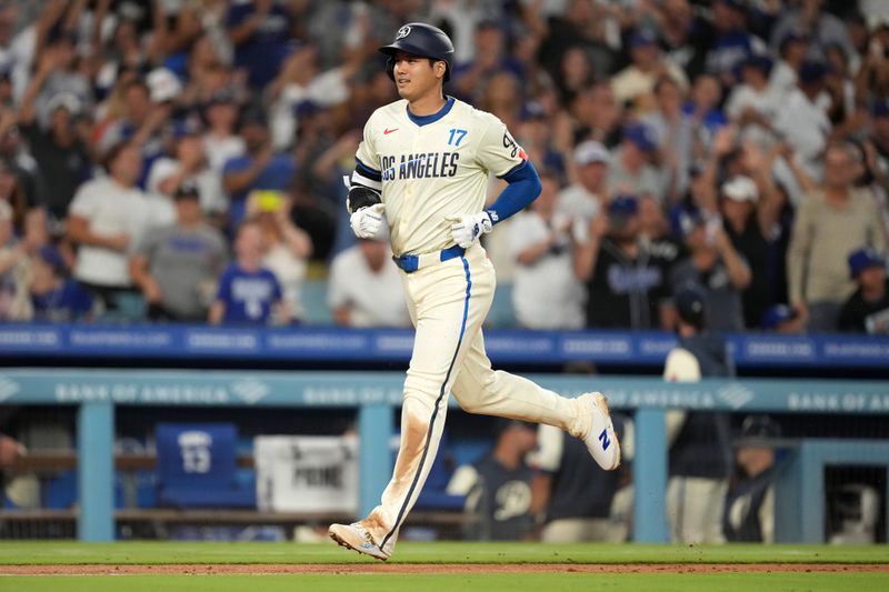 Aug 24, 2024; Los Angeles, California, USA; Los Angeles Dodgers designated hitter Shohei Ohtani (17) runs the bases after hitting a two-run home run in the fifth inning against the Tampa Bay Rays at Dodger Stadium. Mandatory Credit: Kirby Lee-USA TODAY Sports