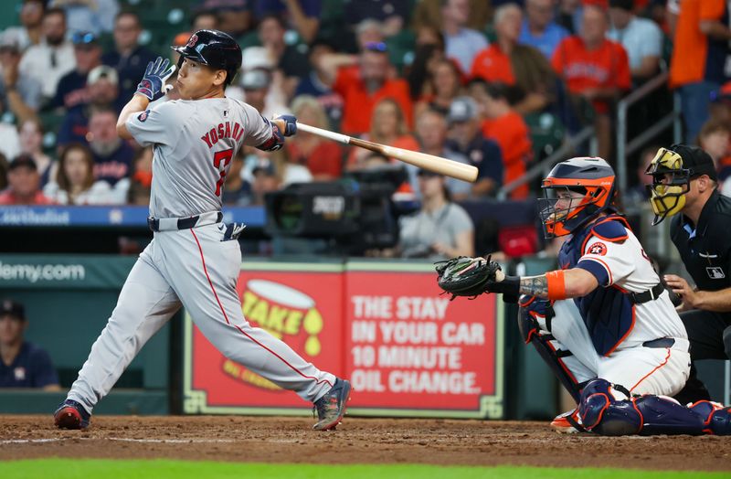 Aug 21, 2024; Houston, Texas, USA; Boston Red Sox designated hitter Masataka Yoshida (7) hits a single against the Houston Astros  in the seventh inning at Minute Maid Park. Mandatory Credit: Thomas Shea-USA TODAY Sports