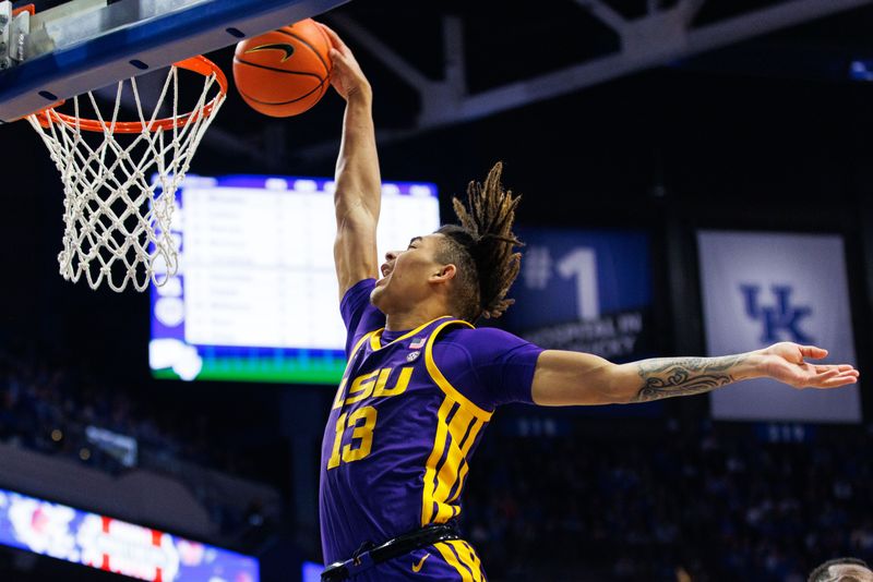 Jan 3, 2023; Lexington, Kentucky, USA; LSU Tigers forward Jalen Reed (13) dunks the ball during the first half against the Kentucky Wildcats at Rupp Arena at Central Bank Center. Mandatory Credit: Jordan Prather-USA TODAY Sports