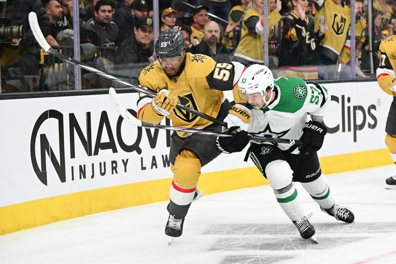 Apr 27, 2024; Las Vegas, Nevada, USA; Vegas Golden Knights right wing Keegan Kolesar (55) and Dallas Stars center Wyatt Johnston (53) chase after the puck in the second period in game three of the first round of the 2024 Stanley Cup Playoffs at T-Mobile Arena. Mandatory Credit: Candice Ward-USA TODAY Sports