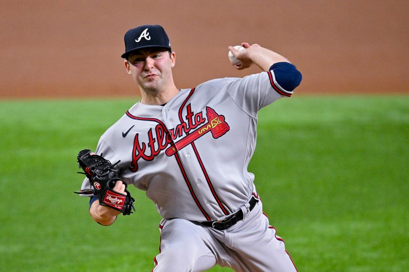 May 16, 2023; Arlington, Texas, USA; Atlanta Braves starting pitcher Jared Shuster (45) pitches against the Texas Rangers during the first inning at Globe Life Field. Mandatory Credit: Jerome Miron-USA TODAY Sports