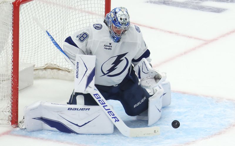 Jan 13, 2026; Pittsburgh, Pennsylvania, USA;  Tampa Bay Lightning goaltender Andrei Vasilevskiy (88) makes a save in overtime against the Pittsburgh Penguins at PPG Paints Arena. Mandatory Credit: Charles LeClaire-Imagn Images