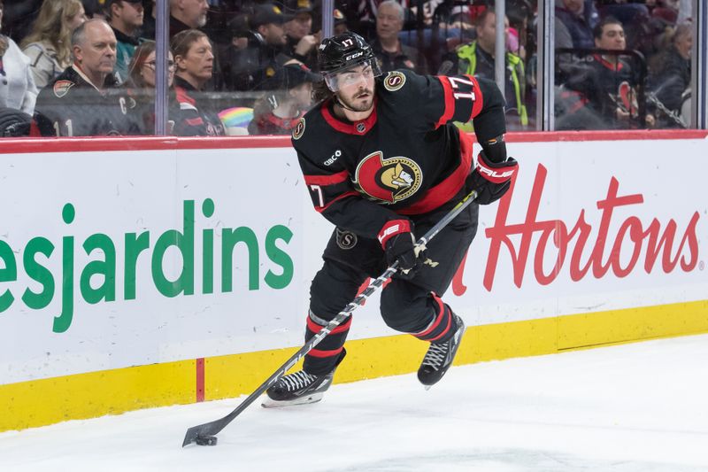 Jan 13, 2024; Ottawa, Ontario, CAN; Ottawa Senators right wing Zack MacEwen (17) skates with the puck in the first period against the San Jose Sharks at the Canadian Tire Centre. Mandatory Credit: Marc DesRosiers-USA TODAY Sports