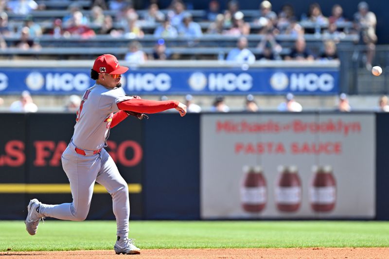 Feb 26, 2025; Tampa, Florida, USA; St. Louis Cardinals shortstop Masyn Winn (0) throws to first base in the first inning against the New York Yankees during spring training at George M. Steinbrenner Field. Mandatory Credit: Jonathan Dyer-Imagn Images