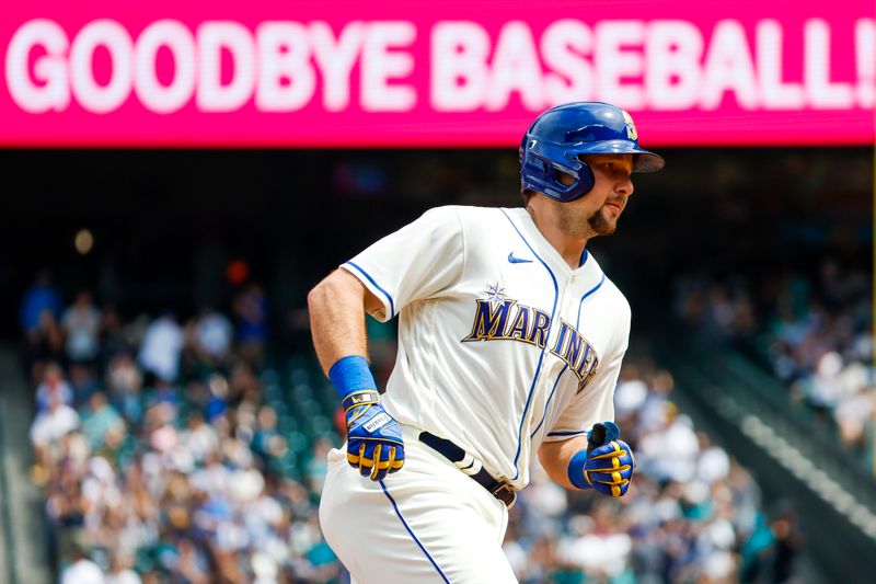 Jul 16, 2023; Seattle, Washington, USA; Seattle Mariners catcher Cal Raleigh (29) runs the bases after hitting a solo-home run against the Detroit Tigers during the fourth inning at T-Mobile Park. Mandatory Credit: Joe Nicholson-USA TODAY Sports