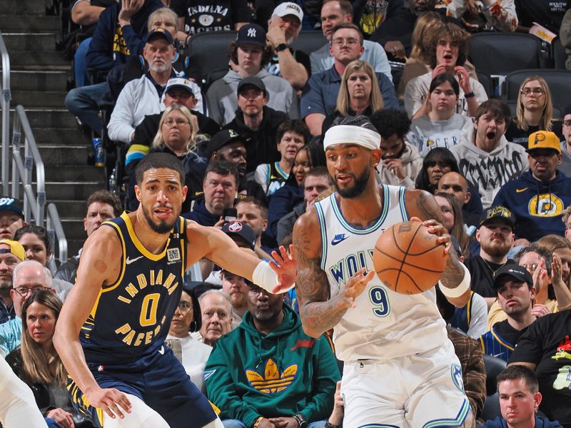 INDIANAPOLIS, IN - MARCH 7: Nickeil Alexander-Walker #9 of the Minnesota Timberwolves dribbles the ball during the game against the Indiana Pacers on March 7, 2024 at Gainbridge Fieldhouse in Indianapolis, Indiana. NOTE TO USER: User expressly acknowledges and agrees that, by downloading and or using this Photograph, user is consenting to the terms and conditions of the Getty Images License Agreement. Mandatory Copyright Notice: Copyright 2024 NBAE (Photo by Ron Hoskins/NBAE via Getty Images)