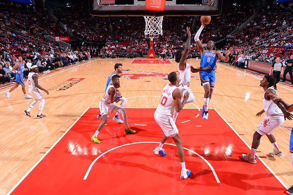 HOUSTON, TX - DECEMBER 6:   Jalen Williams #8 of the Oklahoma City Thunder drives to the basket during the game against the Houston Rockets on December 6, 2023 at the Toyota Center in Houston, Texas. NOTE TO USER: User expressly acknowledges and agrees that, by downloading and or using this photograph, User is consenting to the terms and conditions of the Getty Images License Agreement. Mandatory Copyright Notice: Copyright 2023 NBAE (Photo by Michael Gonzales/NBAE via Getty Images)