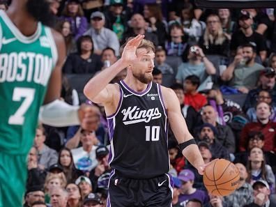 SACRAMENTO, CA - DECEMBER 20:  Domantas Sabonis #10 of the Sacramento Kings handles the ball during the game  on December 20, 2023 at Golden 1 Center in Sacramento, California. NOTE TO USER: User expressly acknowledges and agrees that, by downloading and or using this Photograph, user is consenting to the terms and conditions of the Getty Images License Agreement. Mandatory Copyright Notice: Copyright 2023 NBAE (Photo by Rocky Widner/NBAE via Getty Images)