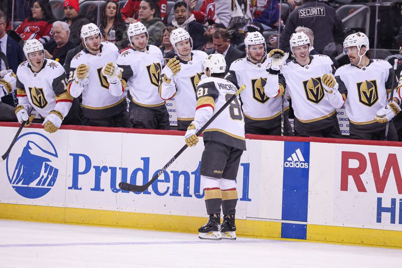 Jan 22, 2024; Newark, New Jersey, USA; Vegas Golden Knights right wing Jonathan Marchessault (81) celebrates his goal with teammates during the second period against the New Jersey Devils at Prudential Center. Mandatory Credit: Vincent Carchietta-USA TODAY Sports