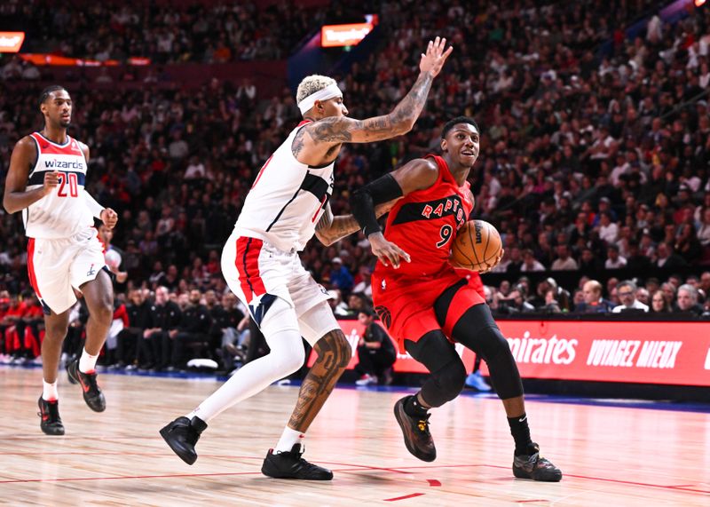 MONTREAL, CANADA - OCTOBER 06: RJ Barrett #9 of the Toronto Raptors dribbles the ball against Kyle Kuzma #33 of the Washington Wizards during the first half of a preseason NBA game at the Bell Centre on October 6, 2024 in Montreal, Quebec, Canada. NOTE TO USER: User expressly acknowledges and agrees that, by downloading and or using this photograph, User is consenting to the terms and conditions of the Getty Images License Agreement. (Photo by Minas Panagiotakis/Getty Images)