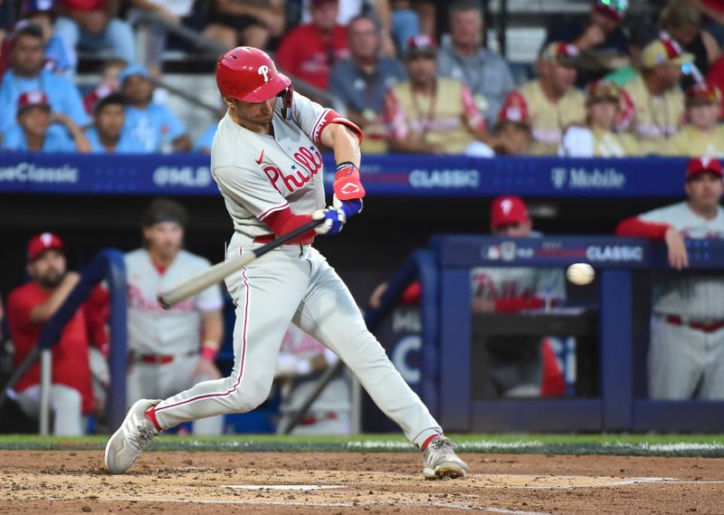 Aug 20, 2023; Williamsport, Pennsylvania, USA; Philadelphia Phillies shortstop Trea Turner (7) singles in the third inning against the Washington Nationals at Muncy Bank Ballpark at Historic Bowman Field. Mandatory Credit: Evan Habeeb-USA TODAY Sports