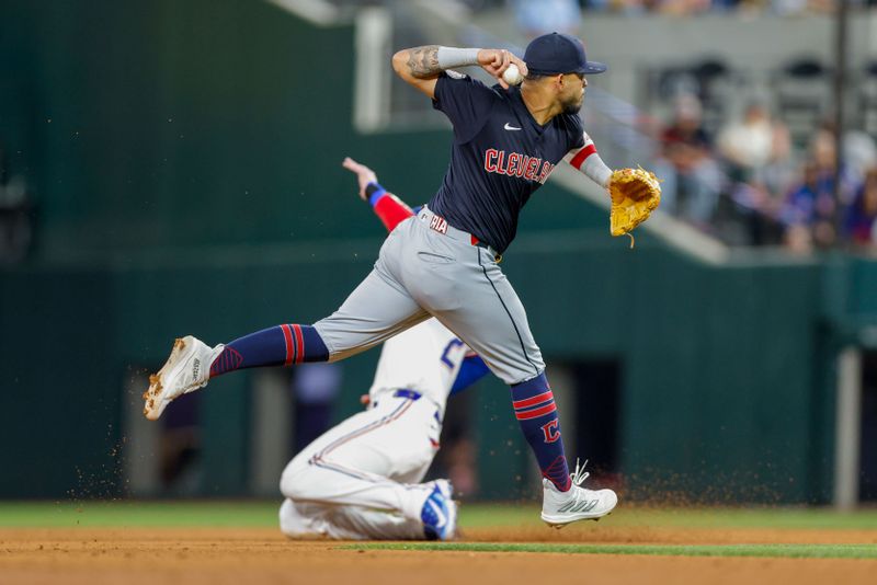 May 15, 2024; Arlington, Texas, USA; Cleveland Guardians third base Gabriel Arias (13) makes a play on a ground ball during the eighth inning against the Texas Rangers at Globe Life Field. Mandatory Credit: Andrew Dieb-USA TODAY Sports