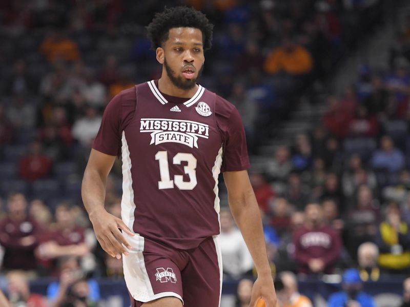 Mar 10, 2023; Nashville, TN, USA;  Mississippi State Bulldogs forward Will McNair Jr. (13) bring the ball up the court during the first half at Bridgestone Arena. Mandatory Credit: Steve Roberts-USA TODAY Sports