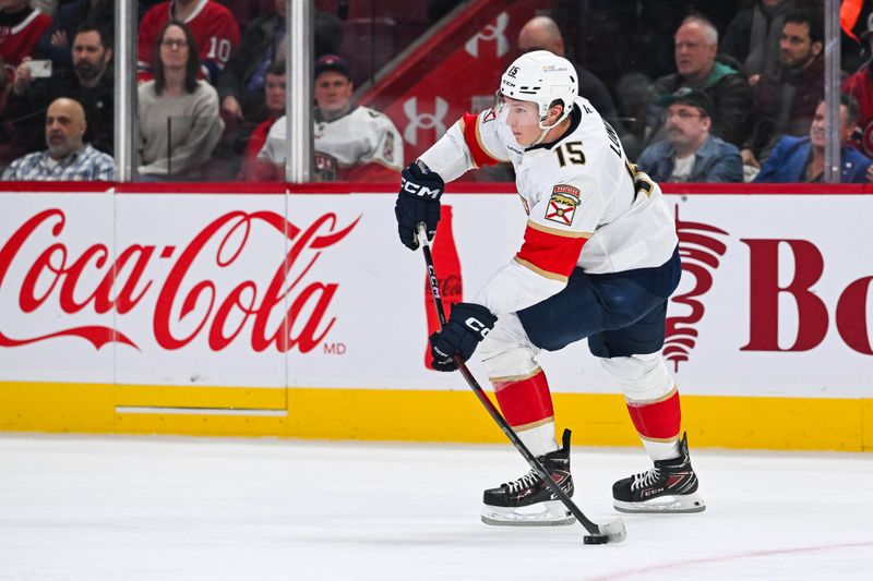 Mar 15, 2025; Montreal, Quebec, CAN; Florida Panthers center Anton Lundell (15) breaks his stick while shooting the puck against the Montreal Canadiens in the third period at Bell Centre. Mandatory Credit: David Kirouac-Imagn Images