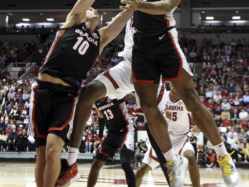 Feb 18, 2023; Tuscaloosa, Alabama, USA; Georgia guard Kario Oquendo (3) and Georgia guard Jaxon Etter (10) work for a rebound against Alabama center Charles Bediako (14) at Coleman Coliseum. Mandatory Credit: Gary Cosby Jr.-USA TODAY Sports