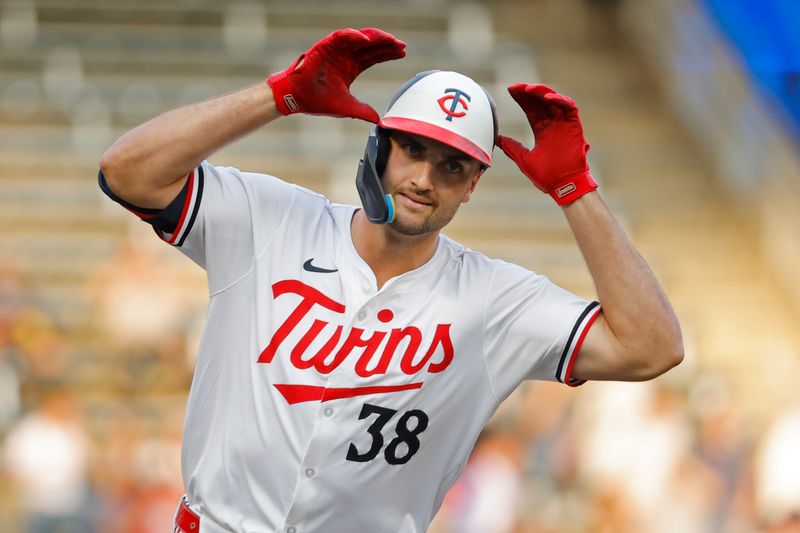 Sep 11, 2024; Minneapolis, Minnesota, USA; Minnesota Twins right fielder Matt Wallner (38) runs the bases and celebrates his solo home run against the Los Angeles Angels in the first inning at Target Field. Mandatory Credit: Bruce Kluckhohn-Imagn Images