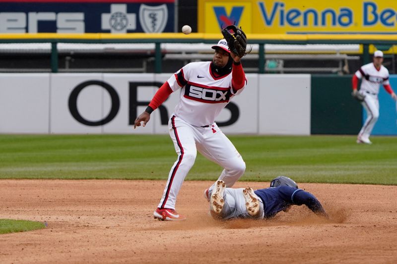 Apr 30, 2023; Chicago, Illinois, USA; Tampa Bay Rays shortstop Taylor Walls (6) steals second base as Chicago White Sox shortstop Elvis Andrus (1) takes the throw during the sixth inning at Guaranteed Rate Field. Mandatory Credit: David Banks-USA TODAY Sports