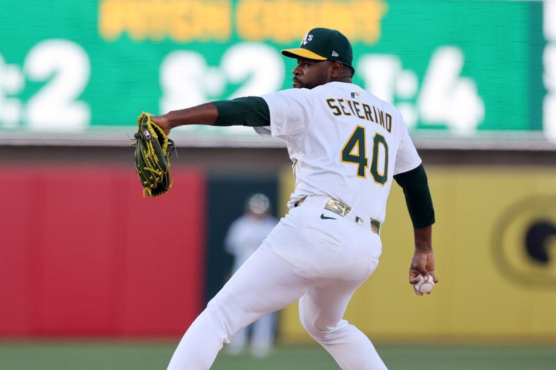 May 5, 2025; West Sacramento, California, USA; Athletics starting pitcher Luis Severino (40) throws against the Seattle Mariners during the first inning at Sutter Health Park. Mandatory Credit: Dennis Lee-Imagn Images