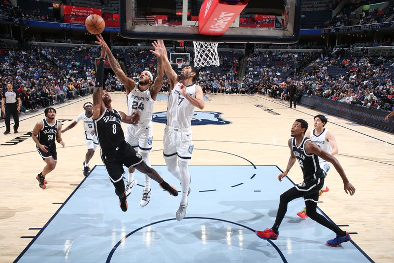 MEMPHIS, TN - February 26:  Lamar Stevens #24 of the Memphis Grizzlies blocks the shot of Lonnie Walker IV #8 of the Brooklyn Nets on February 26, 2024 at FedExForum in Memphis, Tennessee. NOTE TO USER: User expressly acknowledges and agrees that, by downloading and or using this photograph, User is consenting to the terms and conditions of the Getty Images License Agreement. Mandatory Copyright Notice: Copyright 2024 NBAE (Photo by Joe Murphy/NBAE via Getty Images)