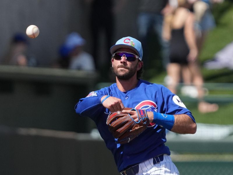 Mar 15, 2026; Mesa, Arizona, USA; Chicago Cubs shortstop Dansby Swanson (7) makes the off balance throw against the Los Angeles Dodgers in the second inning at Sloan Park. Mandatory Credit: Rick Scuteri-Imagn Images