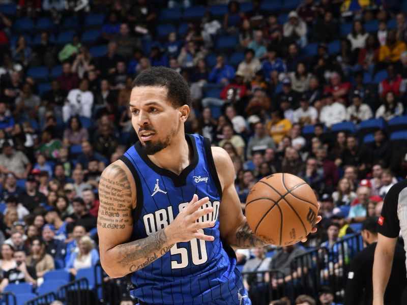 ORLANDO, FL - FEBRUARY 29: Cole Anthony #50 of the Orlando Magic handles the ball during the game against the Utah Jazz on February 29, 2024 at Amway Center in Orlando, Florida. NOTE TO USER: User expressly acknowledges and agrees that, by downloading and or using this photograph, User is consenting to the terms and conditions of the Getty Images License Agreement. Mandatory Copyright Notice: Copyright 2024 NBAE (Photo by Fernando Medina/NBAE via Getty Images)