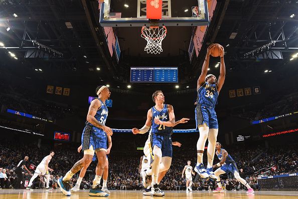 SAN FRANCISCO, CA - JANUARY 2:  Wendell Carter Jr. #34 of the Orlando Magic grabs the rebound during the game  on January 2, 2024 at Chase Center in San Francisco, California. NOTE TO USER: User expressly acknowledges and agrees that, by downloading and or using this photograph, user is consenting to the terms and conditions of Getty Images License Agreement. Mandatory Copyright Notice: Copyright 2024 NBAE (Photo by Noah Graham/NBAE via Getty Images)