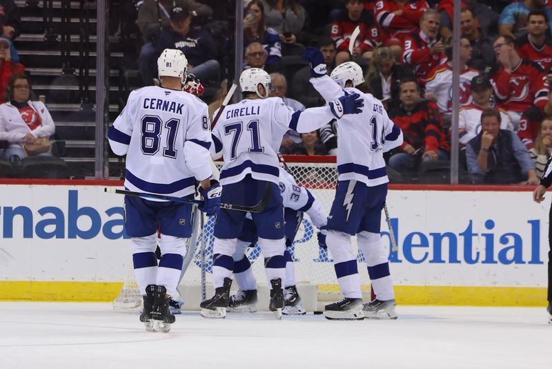 Oct 22, 2024; Newark, New Jersey, USA; Tampa Bay Lightning left wing Brandon Hagel (38) celebrates his goal against the New Jersey Devils during the second period at Prudential Center. Mandatory Credit: Ed Mulholland-Imagn Images