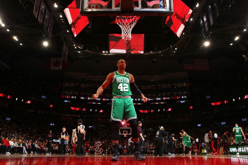 TORONTO, CANADA - JANUARY 15:  Al Horford #42 of the Boston Celtics looks on before the game against the Toronto Raptors on January 15, 2024 at the Scotiabank Arena in Toronto, Ontario, Canada.  NOTE TO USER: User expressly acknowledges and agrees that, by downloading and or using this Photograph, user is consenting to the terms and conditions of the Getty Images License Agreement.  Mandatory Copyright Notice: Copyright 2024 NBAE (Photo by Vaughn Ridley/NBAE via Getty Images)