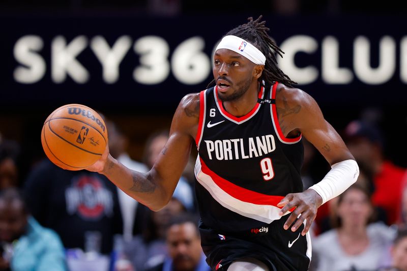 ATLANTA, GA - MARCH 03: Jerami Grant #9 of the Portland Trail Blazers dribbles the ball down the court during the first half against the Atlanta Hawks at State Farm Arena on March 3, 2023 in Atlanta, Georgia. NOTE TO USER: User expressly acknowledges and agrees that, by downloading and or using this photograph, User is consenting to the terms and conditions of the Getty Images License Agreement. (Photo by Todd Kirkland/Getty Images)