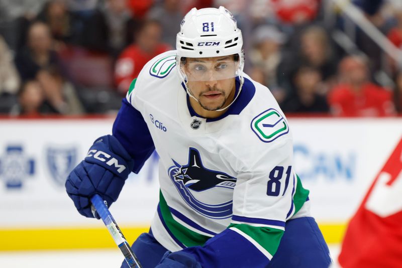 Dec 1, 2024; Detroit, Michigan, USA;  Vancouver Canucks center Dakota Joshua (81) skates in the third period against the Detroit Red Wings at Little Caesars Arena. Mandatory Credit: Rick Osentoski-Imagn Images