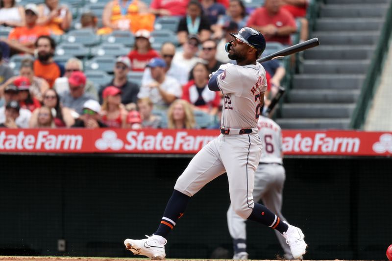 Sep 15, 2024; Anaheim, California, USA;  Houston Astros left fielder Jason Heyward (22) hits a home run during the third inning against the Los Angeles Angels at Angel Stadium. Mandatory Credit: Kiyoshi Mio-Imagn Images