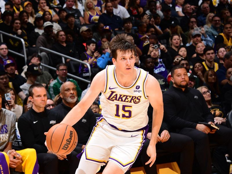 LOS ANGELES, CA - MARCH 10: Austin Reaves #15 of the Los Angeles Lakers dribbles the ball during the game against the Minnesota Timberwolves on March 10, 2024 at Crypto.Com Arena in Los Angeles, California. NOTE TO USER: User expressly acknowledges and agrees that, by downloading and/or using this Photograph, user is consenting to the terms and conditions of the Getty Images License Agreement. Mandatory Copyright Notice: Copyright 2024 NBAE (Photo by Adam Pantozzi/NBAE via Getty Images)