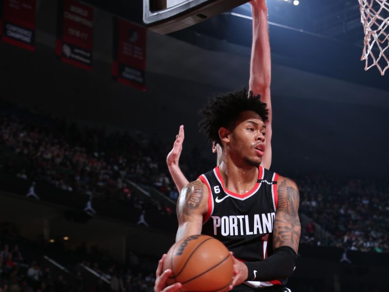 PORTLAND, OR - MARCH 17: Anfernee Simons #1 of the Portland Trail Blazers drives to the basket against the Boston Celtics  on March 17, 2023 at the Moda Center Arena in Portland, Oregon. NOTE TO USER: User expressly acknowledges and agrees that, by downloading and or using this photograph, user is consenting to the terms and conditions of the Getty Images License Agreement. Mandatory Copyright Notice: Copyright 2023 NBAE (Photo by Sam Forencich/NBAE via Getty Images)