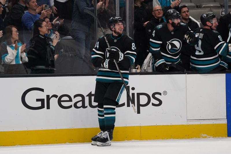 Jan 6, 2026; San Jose, California, USA; San Jose Sharks left wing Pavol Regenda (84) looks up at the scoreboard after scoring a goal in the first period against the Columbus Blue Jackets at SAP Center at San Jose. Mandatory Credit: David Gonzales-Imagn Images
