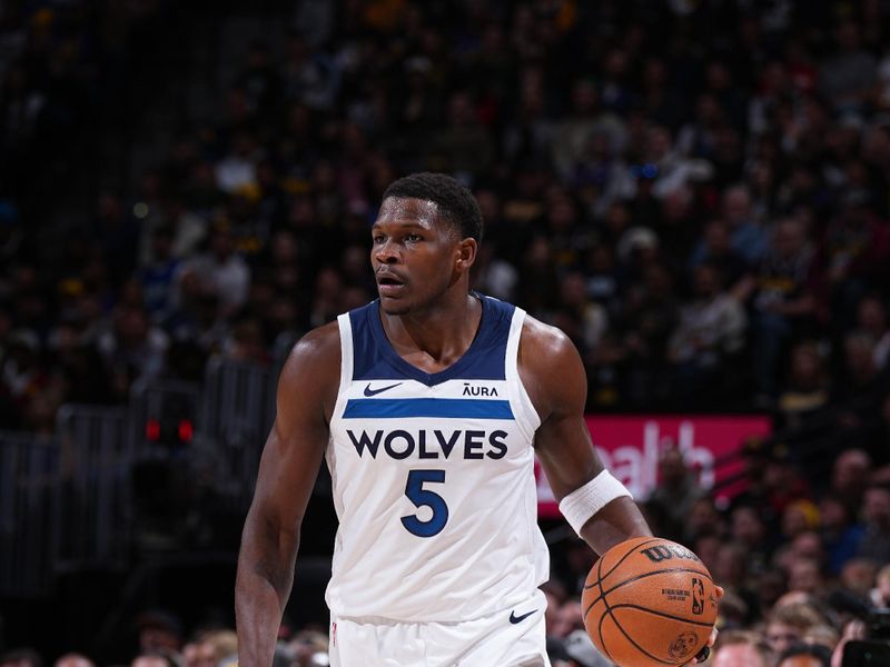 DENVER, CO - APRIL 10: Anthony Edwards #5 of the Minnesota Timberwolves dribbles the ball during the game against the Denver Nuggets on April 10, 2024 at the Ball Arena in Denver, Colorado. NOTE TO USER: User expressly acknowledges and agrees that, by downloading and/or using this Photograph, user is consenting to the terms and conditions of the Getty Images License Agreement. Mandatory Copyright Notice: Copyright 2024 NBAE (Photo by Garrett Ellwood/NBAE via Getty Images)