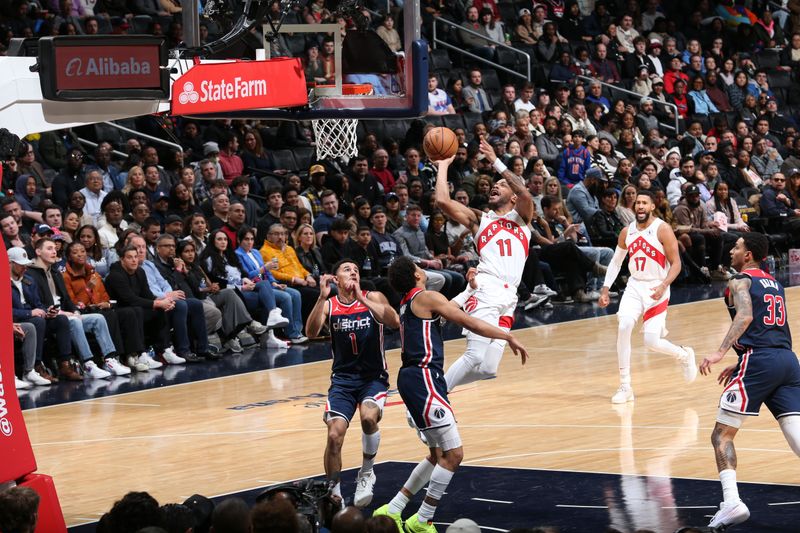 WASHINGTON, DC -? MARCH 23:  Bruce Brown #11 of the Toronto Raptors goes to the basket during the game on March 23, 2024 at Capital One Arena in Washington, DC. NOTE TO USER: User expressly acknowledges and agrees that, by downloading and or using this Photograph, user is consenting to the terms and conditions of the Getty Images License Agreement. Mandatory Copyright Notice: Copyright 2024 NBAE (Photo by Stephen Gosling/NBAE via Getty Images)