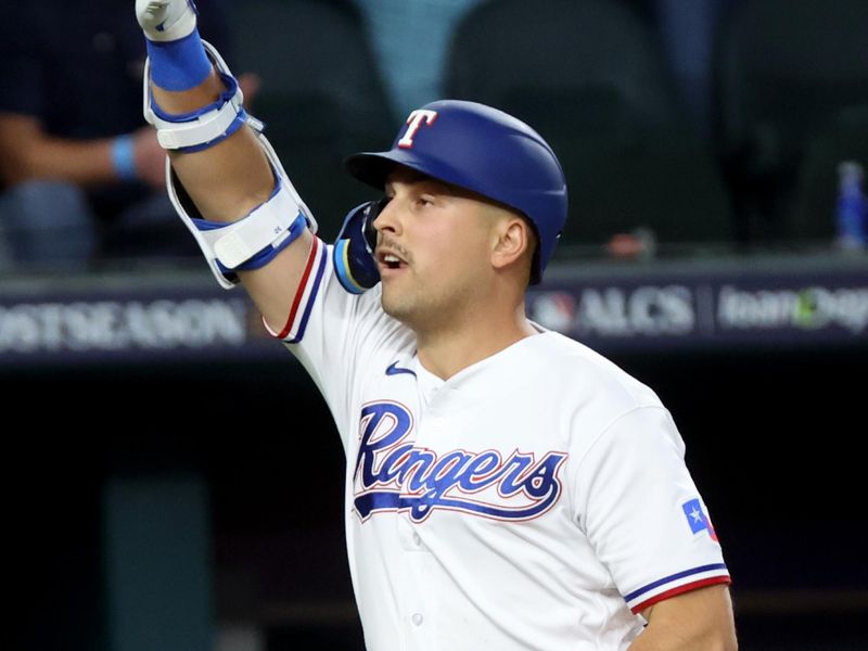 Oct 20, 2023; Arlington, Texas, USA; Texas Rangers first baseman Nathaniel Lowe (30) celebrates after hitting a solo home run during the fifth inning of game five in the ALCS against the Houston Astros for the 2023 MLB playoffs at Globe Life Field. Mandatory Credit: Kevin Jairaj-USA TODAY Sports