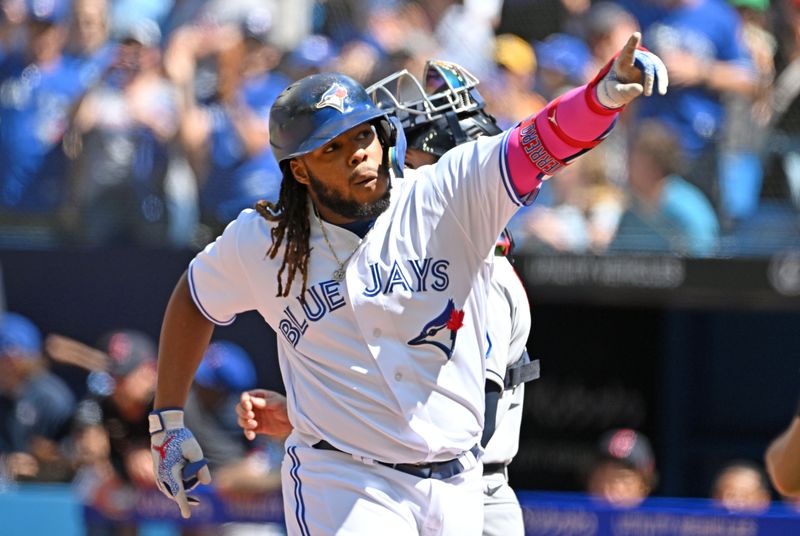 Aug 27, 2023; Toronto, Ontario, CAN;  Toronto Blue Jays designated hitter Vladimir Guerrero Jr. (27) reacts after hitting a two-run home run against the Cleveland Guardians in the first inning at Rogers Centre. Mandatory Credit: Dan Hamilton-USA TODAY Sports