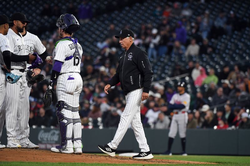 Apr 29, 2025; Denver, Colorado, USA; Colorado Rockies manager Bud Black (10) walks to the mound for a pitching change during the sixth inning against the Atlanta Braves at Coors Field. Mandatory Credit: Christopher Hanewinckel-Imagn Images